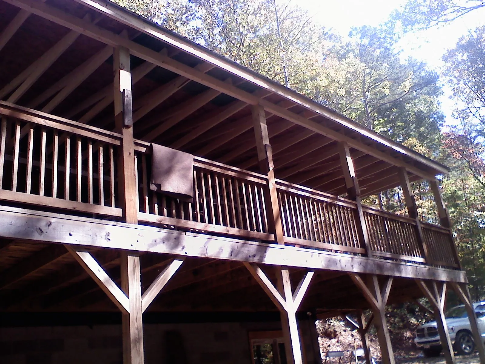 Timber framing under a new elevated porch and deck — Roof Leak Repair in Ehrhardt by Roofing Brothers